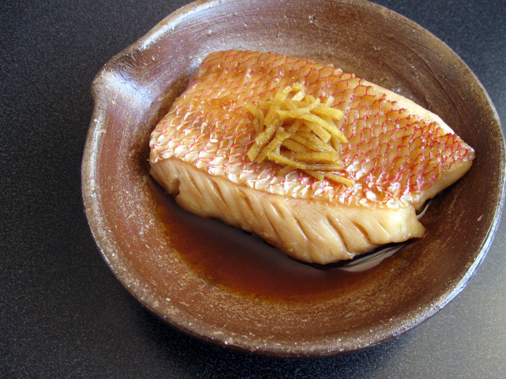 Golden Eye Snapper Simmered in Soy Sauce Stock Photo - Image of spinach,  grill: 168189888